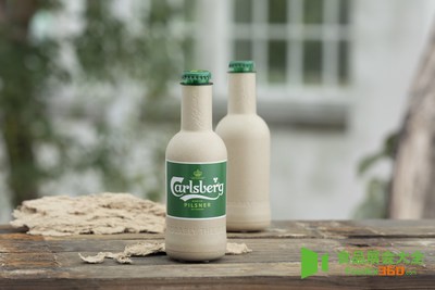 Carlsberg moves a step closer to creating the world’s first ‘paper’ beer bottle. Pictured are the two new research prototypes for Carlsberg’s Green Fibre Bottle, which both co<em></em>ntain beer for the first time and are shown alo<em></em>ngside the sustainably-sourced wood fibre they’re made from.